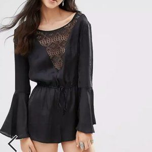 Band Of Gypsies Satin Plunge Neck Lace Romper in Black